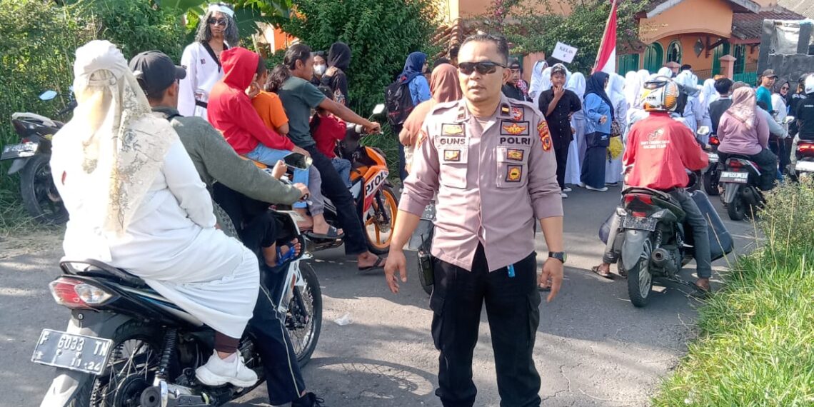 Kanit reskrim polsek kadudampit pimpin pelaksanaan Pengamanan Giat samenan Kenaikan Kelas