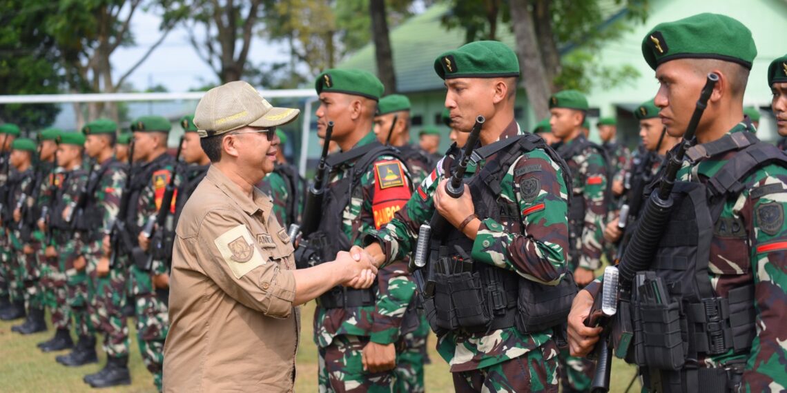 Pelepasan 450 Personil Satgas Pamtas Statis RI-Png Yonif 310