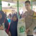 Bhabinkamtibmas desa suka manis polsek kadudampit Monitoring Giat penyaluran beras kepada warga