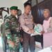 Bhabinkamtibmas Kelurahan Sukakarya Monitoring Pembagian Bansos Beras