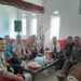 Sambangi Kantor Desa, Bhabinkamtibmas Ajak Perangkat Desa Jaga Kamtibmas