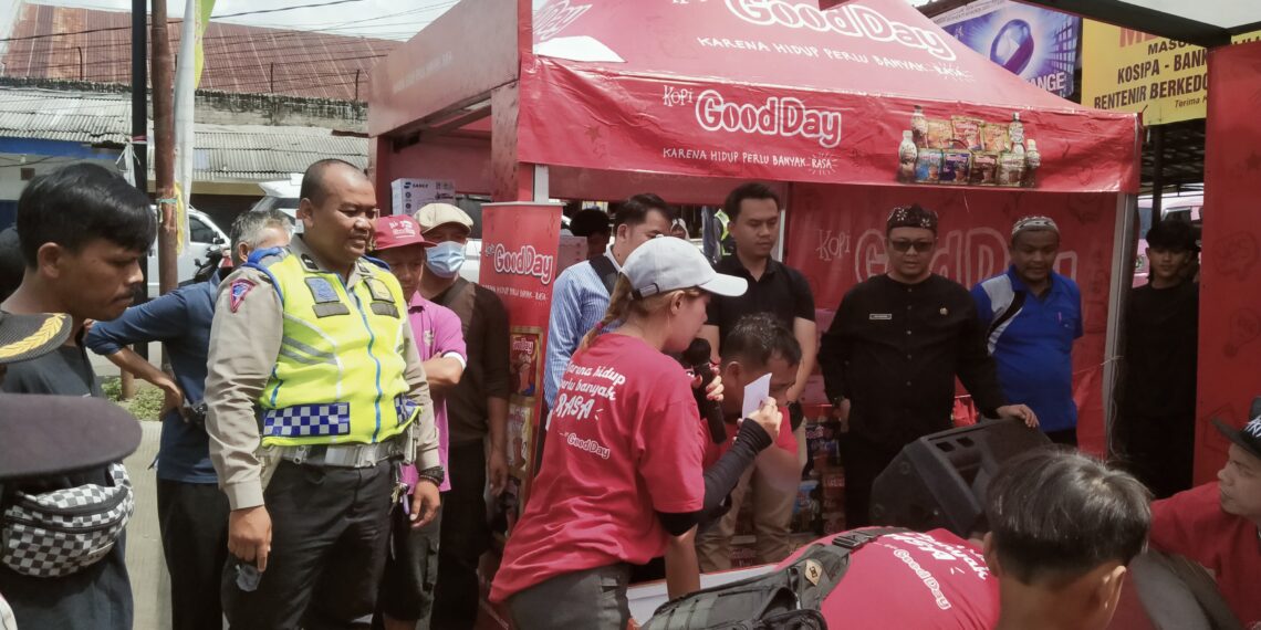 Anggota Polsek Sukaraja Laksanakan Pengamanan Dan Menjadi Saksi Penarikan Undian Berhadiah Kopi Good Day Periode Il Tahun 2024