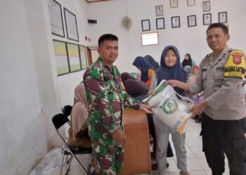 Polsek Gunungguruh Laksanakan Monitoring PAM Pembagian Bantuan Beras kepada KPM