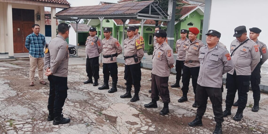 Apel Serah Terima Piket Pengamanan di Sekretariat GOR UNLIP Gudang Logistik Pemilu PPK Citamiang Kota Sukabumi