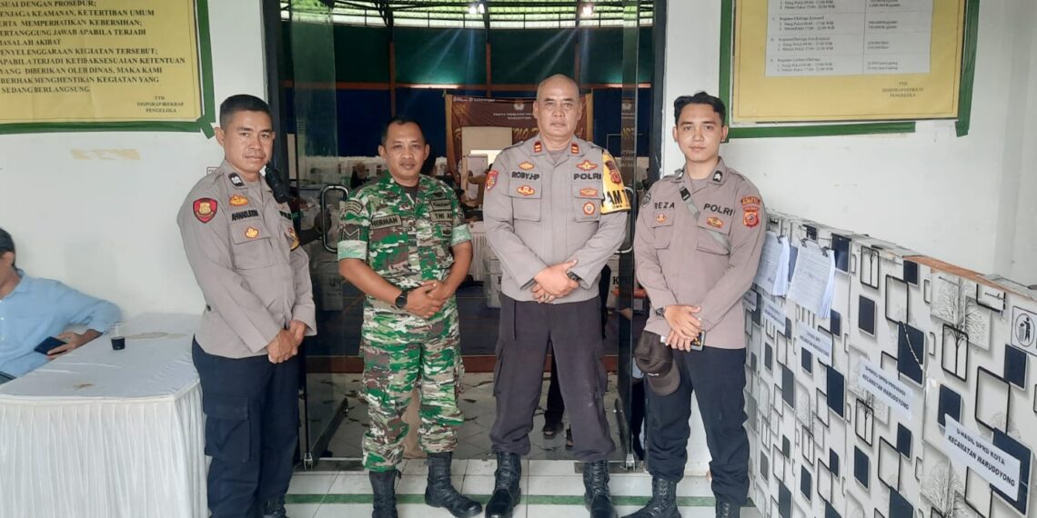 Kapolsek Warudoyong, Pimpin PAM Pengamanan Lanjutan Rapat Pleno Rekapitulasi Penghitungan Suara Tingkat Kecamatan Warudoyong