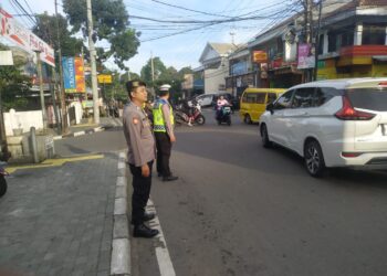Unit Patroli Samapta Polsek Cikole Laksanakan Giat Pengaturan di Jalan Bhayangkara Kota Sukabumi