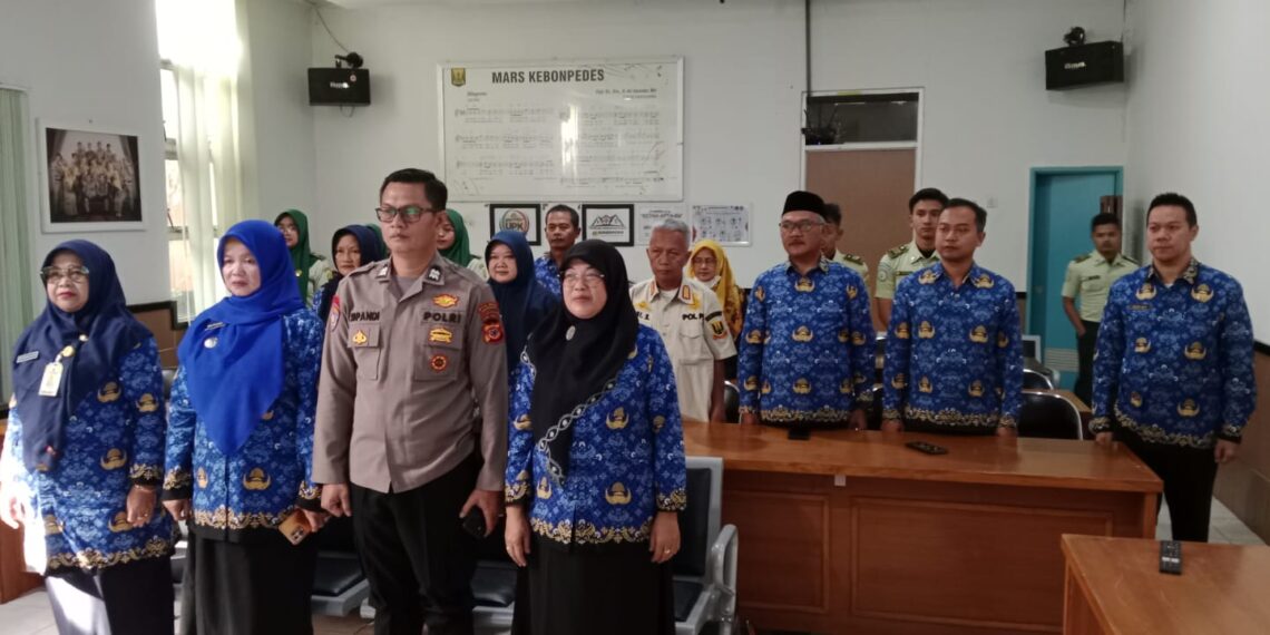 Ps. Kanit Binmas Polsek Kebonpedes Hadiri Upacara Hardiknas Bersama Forkopimcam
