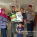 Bhabinkamtibmas Kelurahan Nyomplong Monitoring Pembagian Bansos Beras