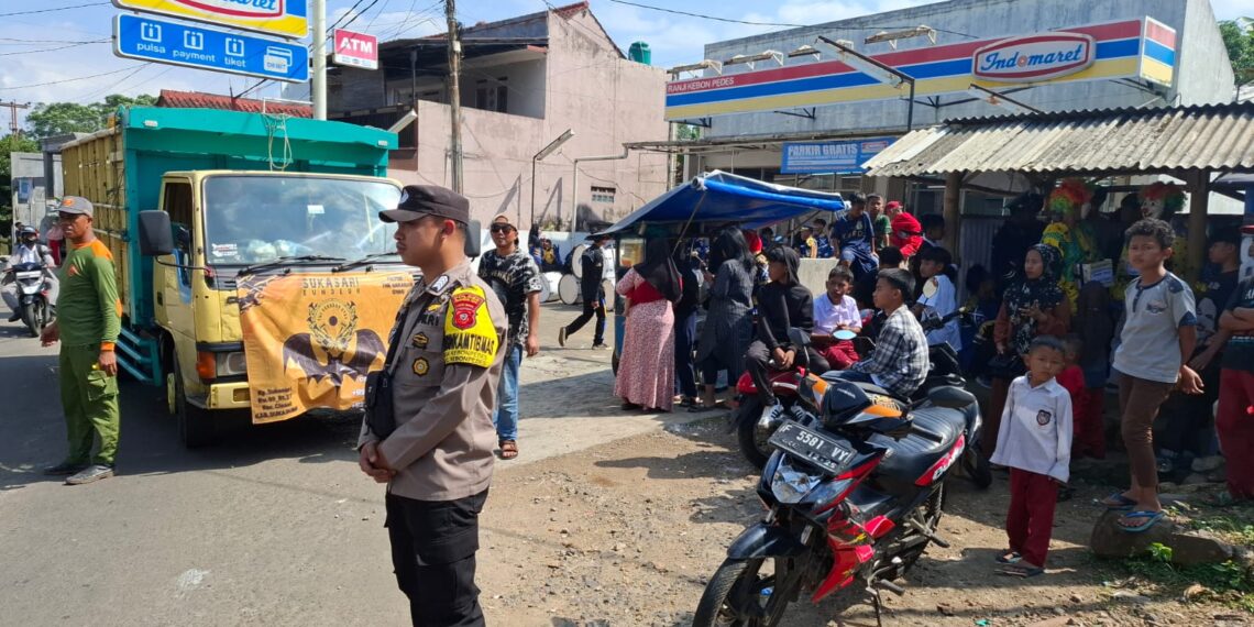Bhabinkamtibmas Polsek Kebonpedes Lakukan Pengamanan Kenaikan Kelas Dan Perpisahan SDN Ranji