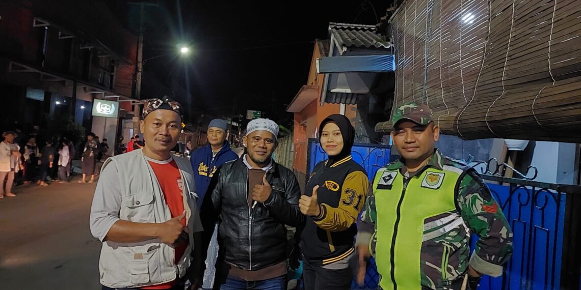 Sinergitas TNI -POLRI Bhabinkamtibmas Bersama Babinsa Lakukan Pengamanan Jalur Pawai Obor Dalam Rangka Tahun Baru Islam.