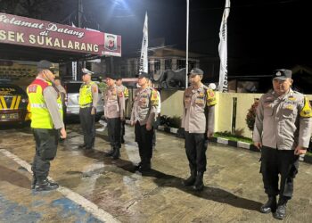 Kapolsek Sukalarang Pimpin Pelaksanaan Apel pengamanan Tahun Baru Islam 1446 H di Mako Polsek Sukalarang