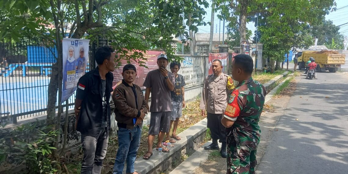 Sinegritas TNI-Polri Sambang warga Jayamekar laksanakan jum’at bersih