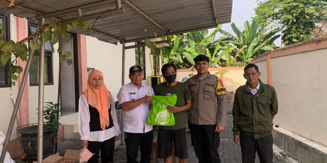 Bhabinkamtibmas Kel. Citamiang Polsek Citamiang Cooling System dan Pembagian Sembako