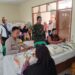 Bhabinkamtibmas Kelurahan Sukakarya Monitoring Pembagian Bansos Beras